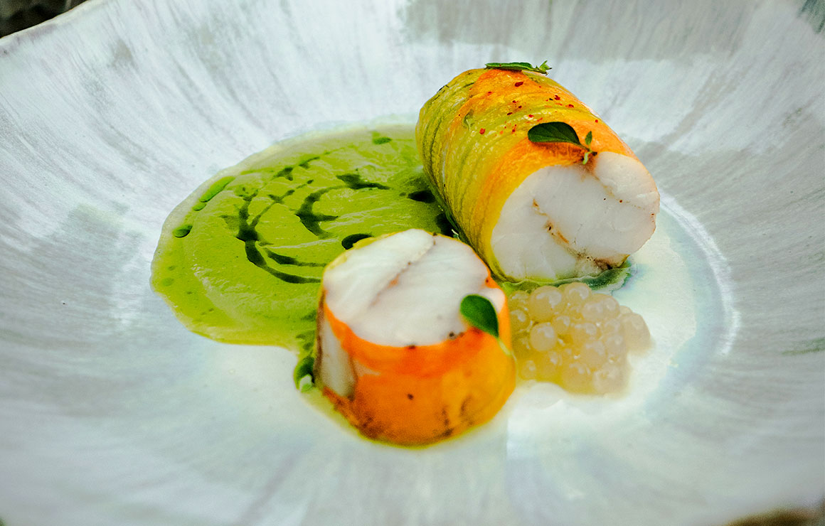 Loup et fleur de courgette